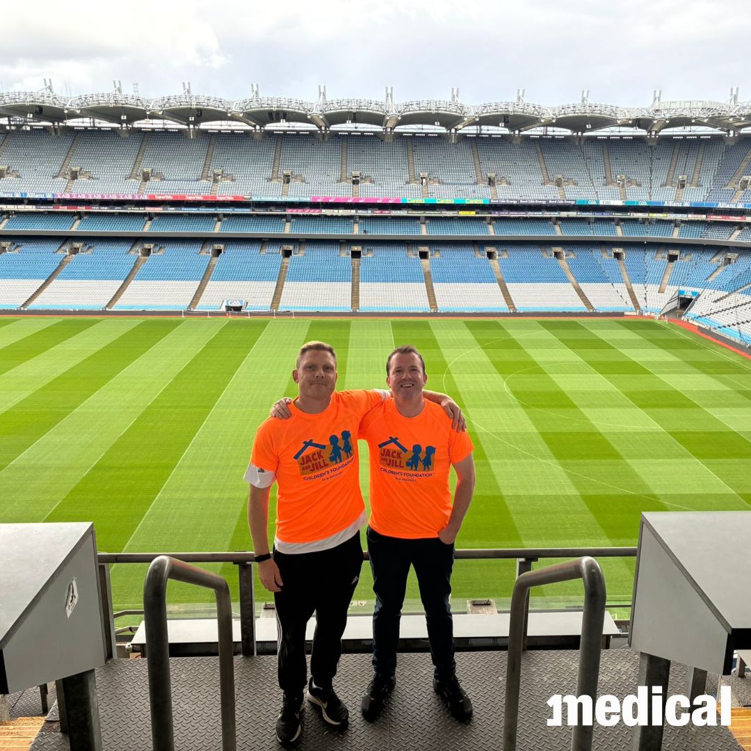 Liam McGrath and Diarmuid O'Mahony pitchside at Croke Park after the abseil